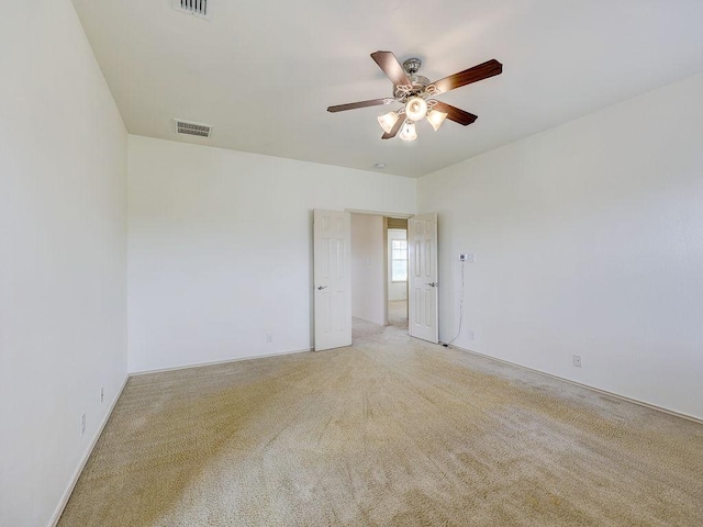 11509 Timber Heights Dr, Austin, TX 78754 - empty room with ceiling fan and light colored carpet