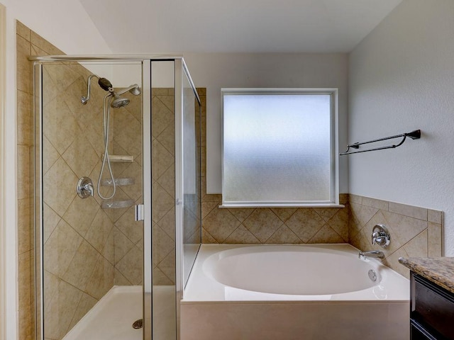 11509 Timber Heights Dr, Austin, TX 78754 - full bathroom featuring a garden tub, a stall shower, and vanity