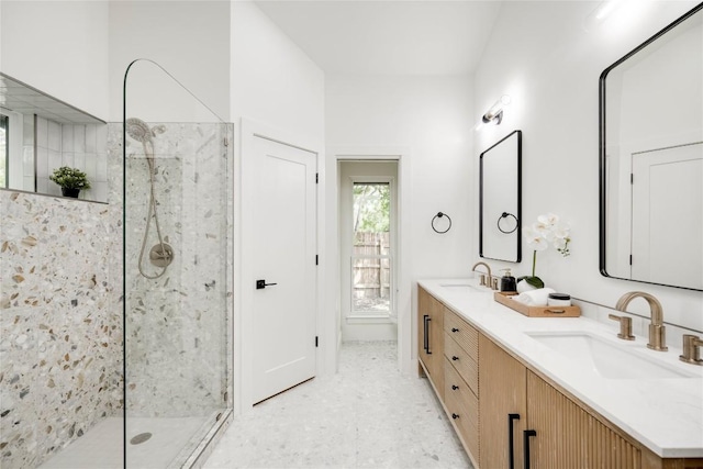 12044 Lincolnshire Dr, Austin, TX 78758 - bathroom featuring double vanity and a marble finish shower
