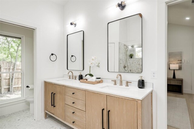 12044 Lincolnshire Dr, Austin, TX 78758 - full bath featuring double vanity and a shower