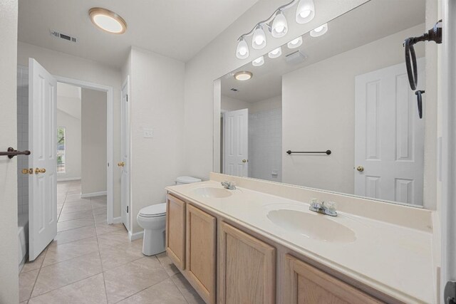 1500 Amelia Dr, Cedar Park, TX 78613 - bathroom featuring double vanity and tile patterned floors