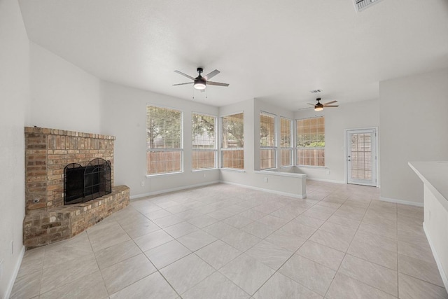 1500 Amelia Dr, Cedar Park, TX 78613 - unfurnished living room featuring a ceiling fan, a fireplace, and light tile patterned floors