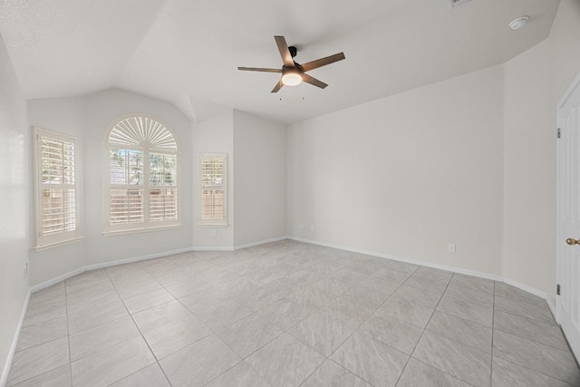 1500 Amelia Dr, Cedar Park, TX 78613 - spare room featuring a ceiling fan, light tile patterned floors, and lofted ceiling