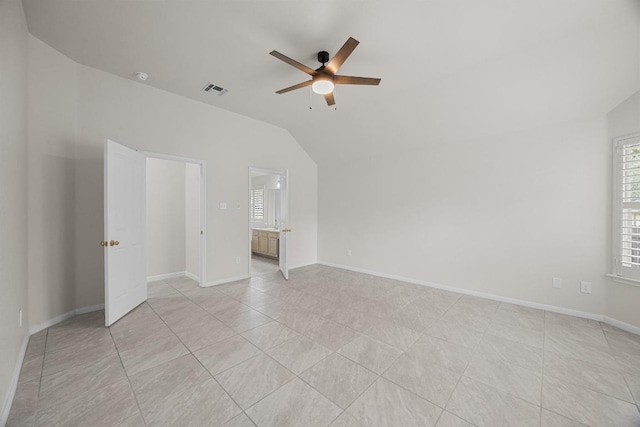 1500 Amelia Dr, Cedar Park, TX 78613 - spare room featuring a ceiling fan, lofted ceiling, healthy amount of natural light, and light tile patterned floors
