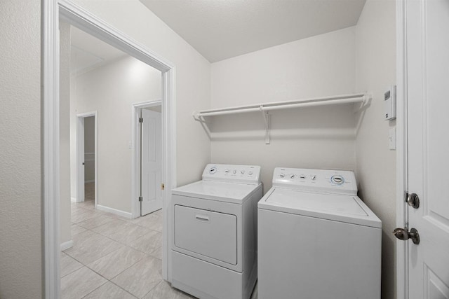 1500 Amelia Dr, Cedar Park, TX 78613 - washroom with independent washer and dryer and light tile patterned floors