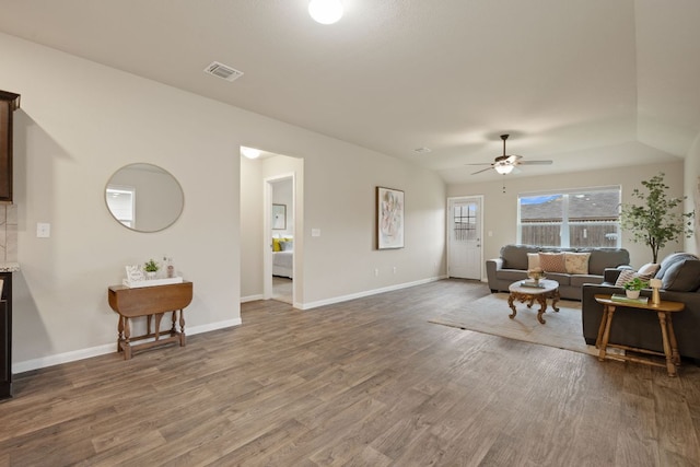 3305 Tilmon Ln, Austin, TX 78725 - living area featuring wood finished floors and ceiling fan