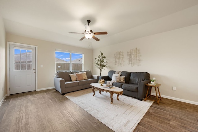 3305 Tilmon Ln, Austin, TX 78725 - living area featuring wood finished floors and ceiling fan