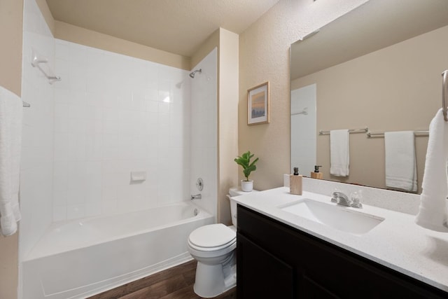 3305 Tilmon Ln, Austin, TX 78725 - bathroom with wood finished floors, vanity, and shower / bathtub combination