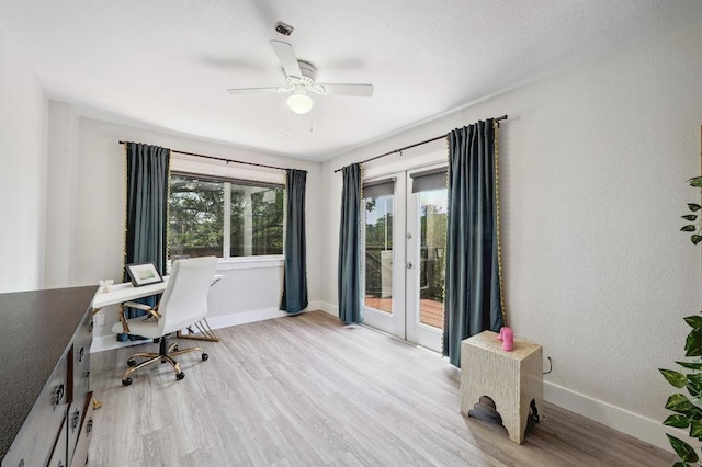15507 NE Enid Dr, Austin, TX 78734 - office space featuring french doors, wood finished floors, and ceiling fan