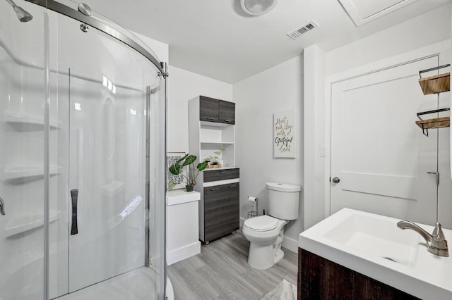 15507 Enid Dr, Austin, TX 78734 - bathroom with wood finished floors, vanity, and a shower stall