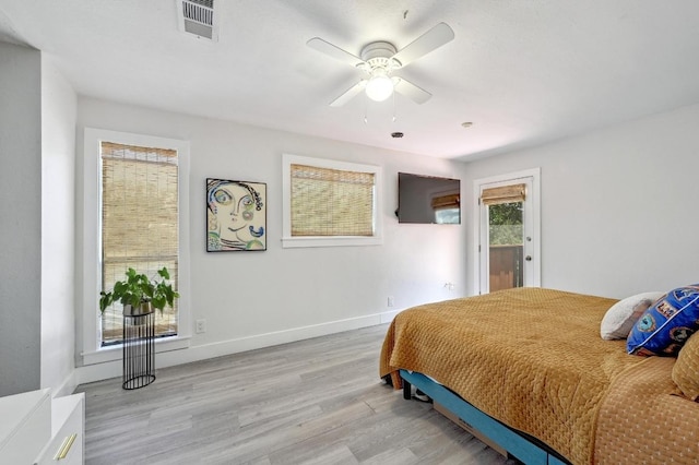 15507 Enid Dr, Austin, TX 78734 - bedroom with light wood-type flooring, access to outside, and a ceiling fan