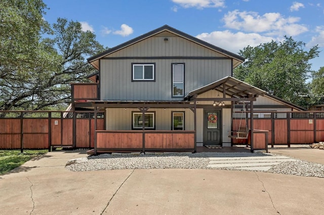 15507 NE Enid Dr, Austin, TX 78734 - view of front facade with a porch and a gate
