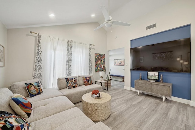 15507 NE Enid Dr, Austin, TX 78734 - living room featuring wood finished floors, a ceiling fan, vaulted ceiling, and recessed lighting
