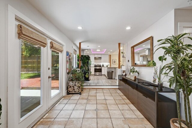 15507 NE Enid Dr, Austin, TX 78734 - entryway featuring healthy amount of natural light, light tile patterned floors, and recessed lighting