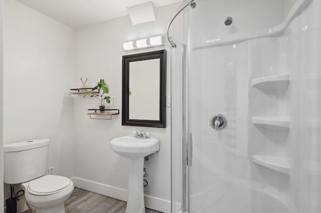 15507 NE Enid Dr, Austin, TX 78734 - bathroom featuring a stall shower and wood finished floors