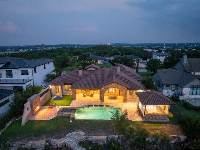 908 Watercliffe Dr, Lago Vista, TX 78645 - aerial perspective of suburban area with a pool