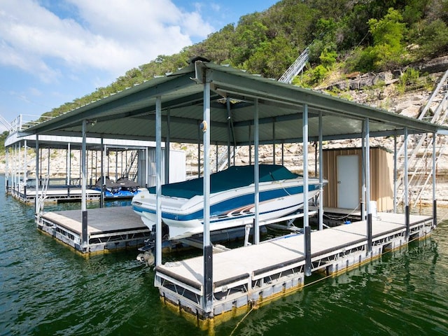908 Watercliffe Dr, Lago Vista, TX 78645 - dock featuring a water view and boat lift
