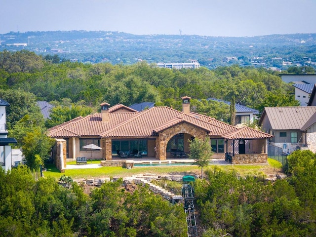 908 Watercliffe Dr, Lago Vista, TX 78645 - view of subject property featuring a heavily wooded area