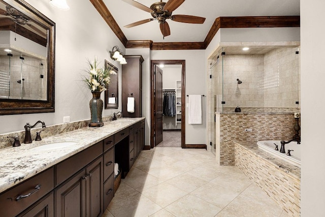 908 Watercliffe Dr, Lago Vista, TX 78645 - bathroom with a shower stall, double vanity, crown molding, a garden tub, and a ceiling fan