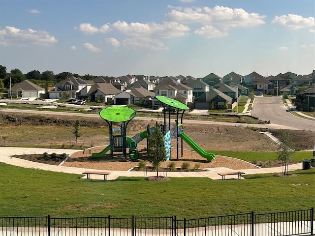 9509 Demure Dr Unit 4, Manor, TX 78653 - communal playground with a residential view