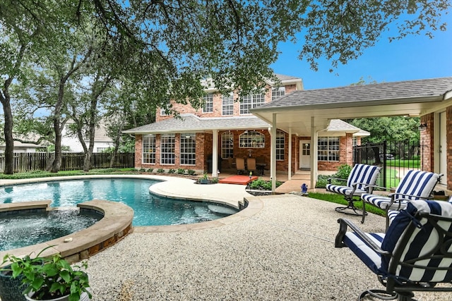 10309 Van Winkle Ct, Austin, TX 78739 - view of pool with a patio area, a fenced backyard, and a pool with connected hot tub