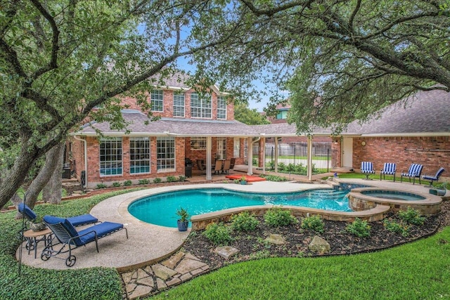 10309 Van Winkle Ct, Austin, TX 78739 - view of pool with a patio area and a pool with connected hot tub