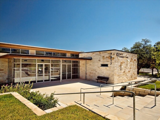 10309 Van Winkle Ct, Austin, TX 78739 - back of house with a patio area and a sunroom
