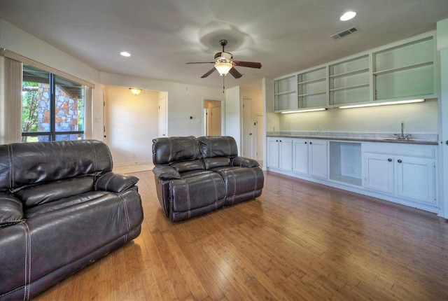 13111 Mansfield Dr, Austin, TX 78732 - living area with a ceiling fan, hardwood / wood-style flooring, and recessed lighting