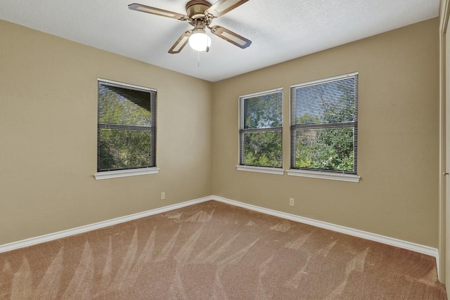 642 Lakebreeze Dr, Canyon Lake, TX 78133 - carpeted spare room featuring baseboards and ceiling fan