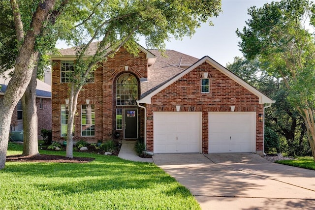 4105 Canyon Glen Cir, Austin, TX 78732 - traditional home featuring an attached garage, driveway, brick siding, a front lawn, and roof with shingles