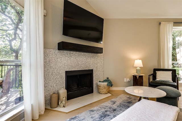 4105 Canyon Glen Cir, Austin, TX 78732 - living room featuring vaulted ceiling and a fireplace
