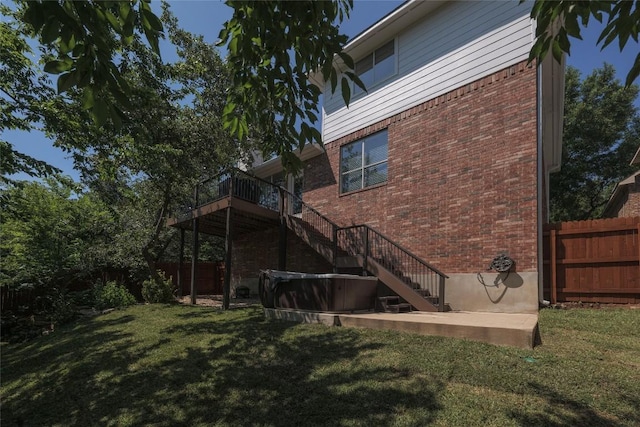 4105 Canyon Glen Cir, Austin, TX 78732 - rear view of house featuring brick siding, stairway, and a wooden deck