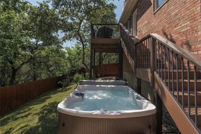 4105 Canyon Glen Cir, Austin, TX 78732 - fenced backyard with a hot tub, stairway, and a deck