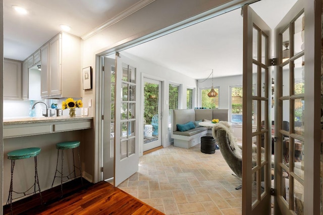 2606 Rockingham Dr, Austin, TX 78704 - sunroom with french doors and a sink