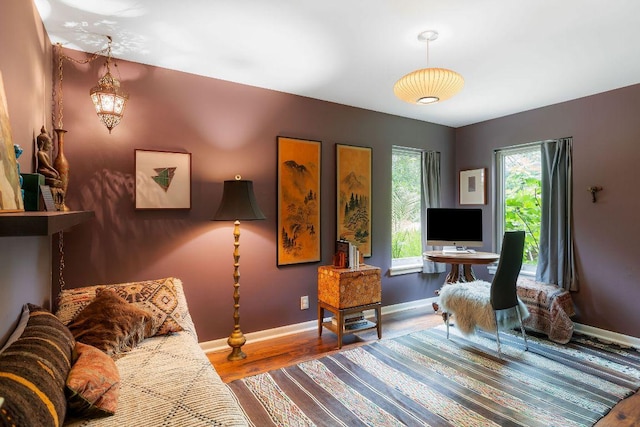 2606 Rockingham Dr, Austin, TX 78704 - living room featuring wood finished floors and a chandelier
