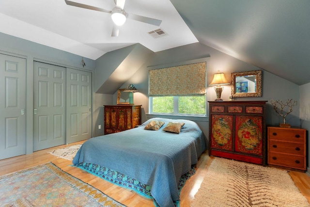 2606 Rockingham Dr, Austin, TX 78704 - bedroom with wood finished floors, vaulted ceiling, a ceiling fan, and a closet