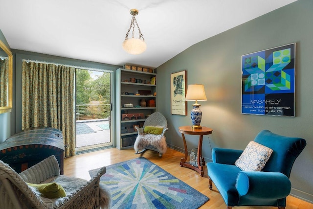 2606 Rockingham Dr, Austin, TX 78704 - sitting room with wood finished floors and lofted ceiling