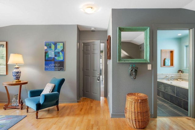 2606 Rockingham Dr, Austin, TX 78704 - foyer featuring light wood-type flooring and vaulted ceiling