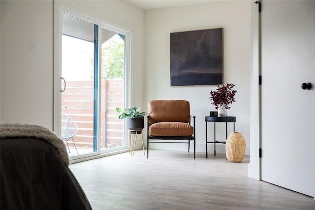 5731 Wellington Dr, Austin, TX 78723 - sitting room with plenty of natural light and wood finished floors