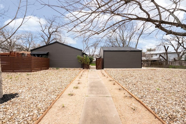 5731 Wellington Dr, Austin, TX 78723 - view of yard with a storage unit