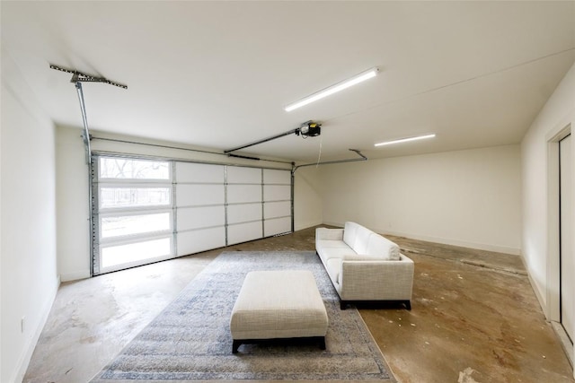 5731 Wellington Dr, Austin, TX 78723 - garage with a garage door opener and baseboards