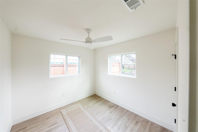 5731 Wellington Dr, Austin, TX 78723 - spare room with light wood-style flooring and ceiling fan