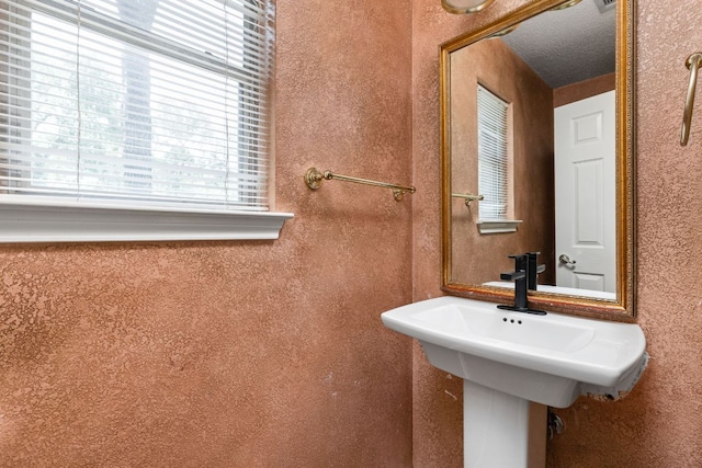 11978 Dorsett Rd, Austin, TX 78727 - bathroom featuring plenty of natural light