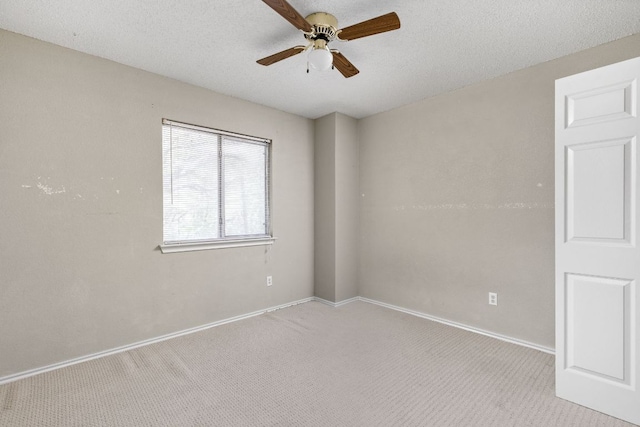 11978 Dorsett Rd, Austin, TX 78727 - carpeted spare room with a ceiling fan and a textured ceiling