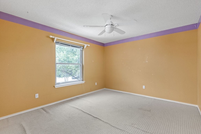 11978 Dorsett Rd, Austin, TX 78727 - empty room with carpet, a ceiling fan, and a textured ceiling