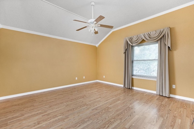 11978 Dorsett Rd, Austin, TX 78727 - spare room with vaulted ceiling, light wood-style flooring, crown molding, a ceiling fan, and a textured ceiling