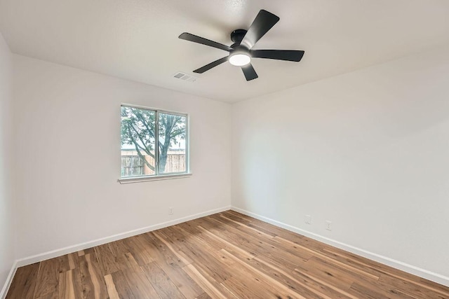 16825 Hamilton Point Cir, Manor, TX 78653 - empty room featuring light wood-style floors and ceiling fan