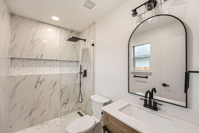 16825 Hamilton Point Cir, Manor, TX 78653 - full bath featuring vanity, a marble finish shower, and recessed lighting