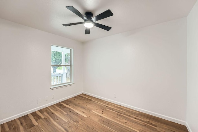 16825 Hamilton Point Cir, Manor, TX 78653 - empty room with wood finished floors and ceiling fan