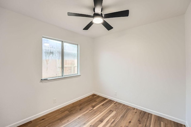 16825 Hamilton Point Cir, Manor, TX 78653 - empty room featuring wood finished floors and a ceiling fan